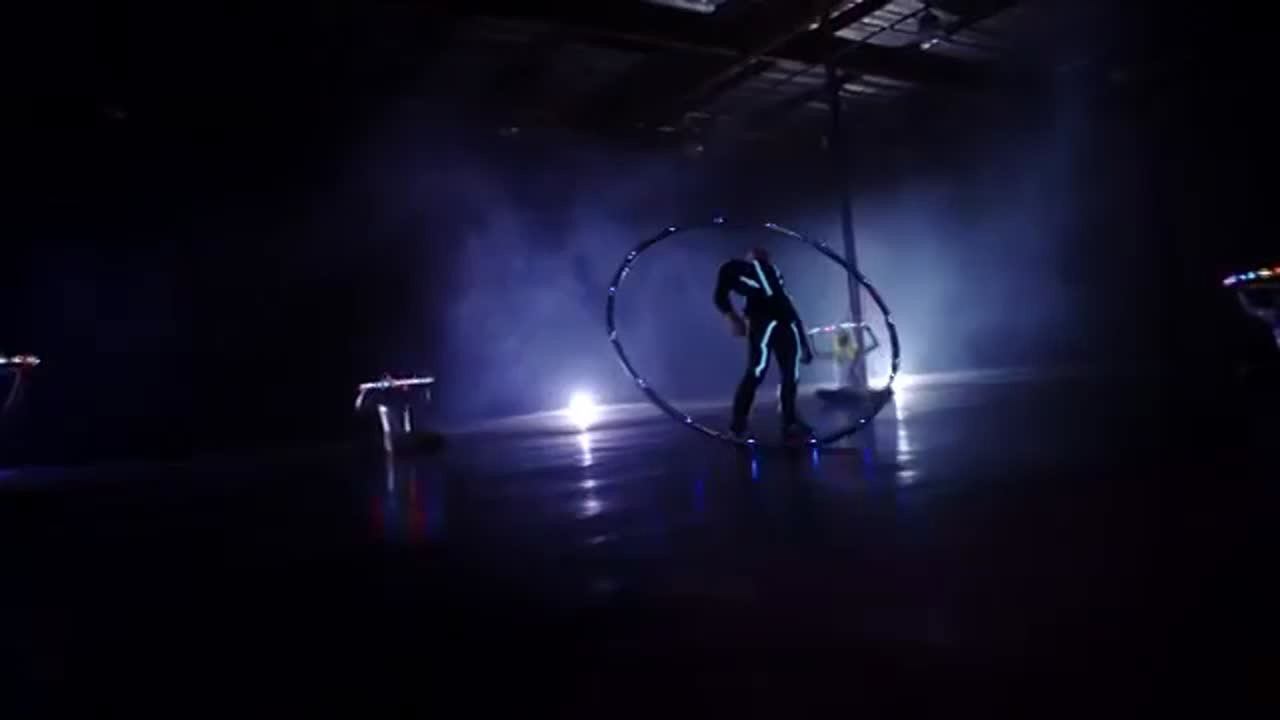 Captivating LED Cyr Wheel Performer | Altus Entertainment