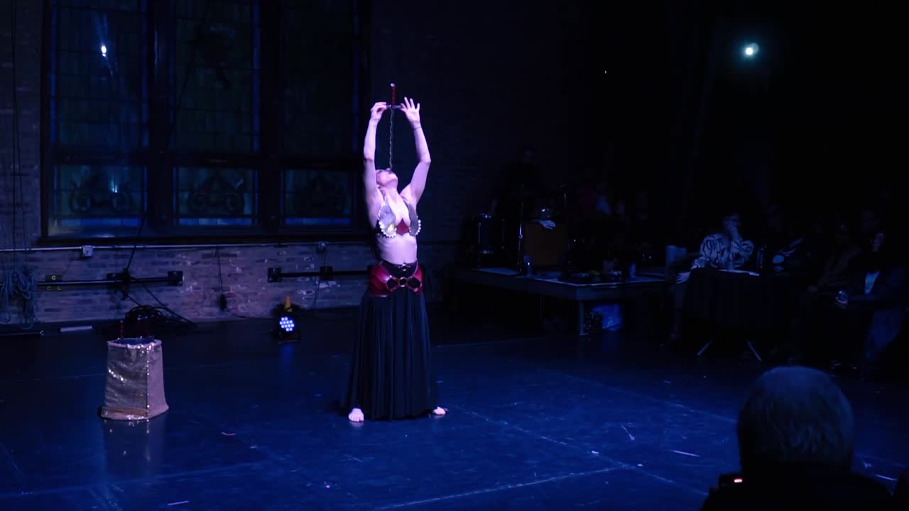 Stunning Female Sword Swallower | Altus Entertainment